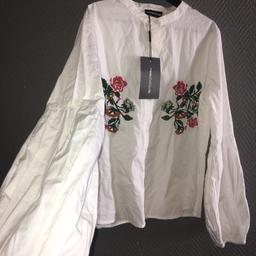 Size: UK 10
Colour: White with multicoloured
Design: Balloon puff sleeve high neck floral embroidered shirt blouse
Brand: Pretty Little Thing
Condition: Brand new with tags (slight mark above inside label shown in picture 3)
—
Tags:
(white, green, red, pink, yellow, blue, grey)
(embroidered, high neck, long sleeve, blouse, modest, shirt, buttons, unworn, floral, summer, beach, holiday, party, celebration, wedding)
Extra £3 shipping via Royal Mail