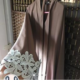 Size: UK XL / 60”
Colour: Mocha nude and white
Design: Open front tie up abaya has lace around the sleeves and at the bottom.
Condition: Brand new, never worn

***Comes with plain white chiffon material hijab***
***All pics of this are in natural daylight.***

—
Tags:
(kaftan, kimono, dubai, abaya, farasha, jalabiya, maxi dress, jilbab, eid, ramadan, wedding, nikah, walimah, mehndi, party, modest, prom)