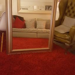 Large wall mirror, bevelled glass, solid wood frame finished in champagne. Framed size 122cm x 97cm. Mirrored area 100cm x75cm. NO OFFERS, buyer collects. EC1V
