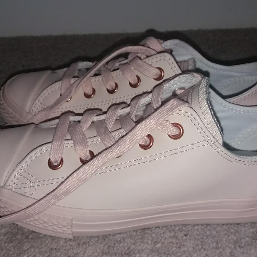 Rose gold eyelet on sale converse