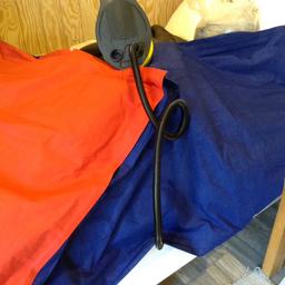 Red and blue strong canvas air bed plus foot pump to inflate and deflate. Only used once.