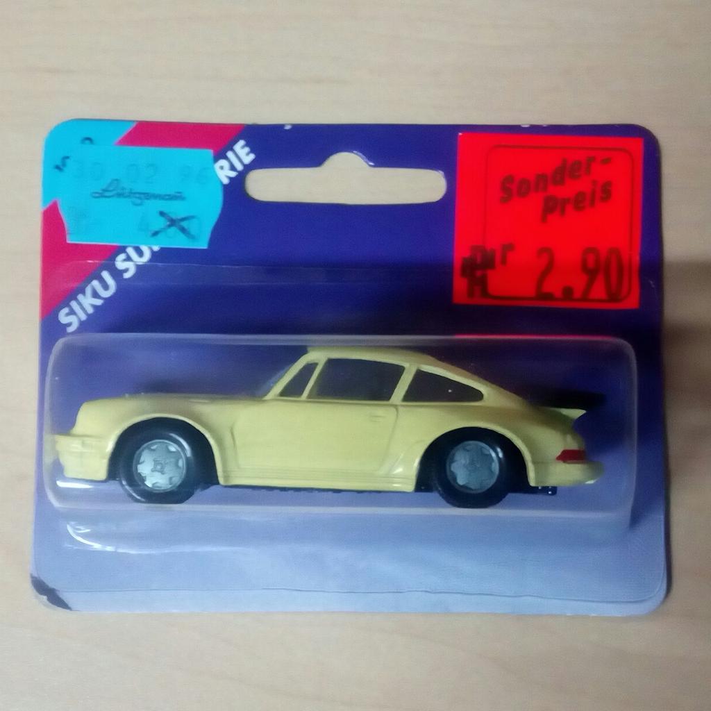 Siku Porsche 911, 1059, gelb, Spielzeugauto in 88515 Langenenslingen ...