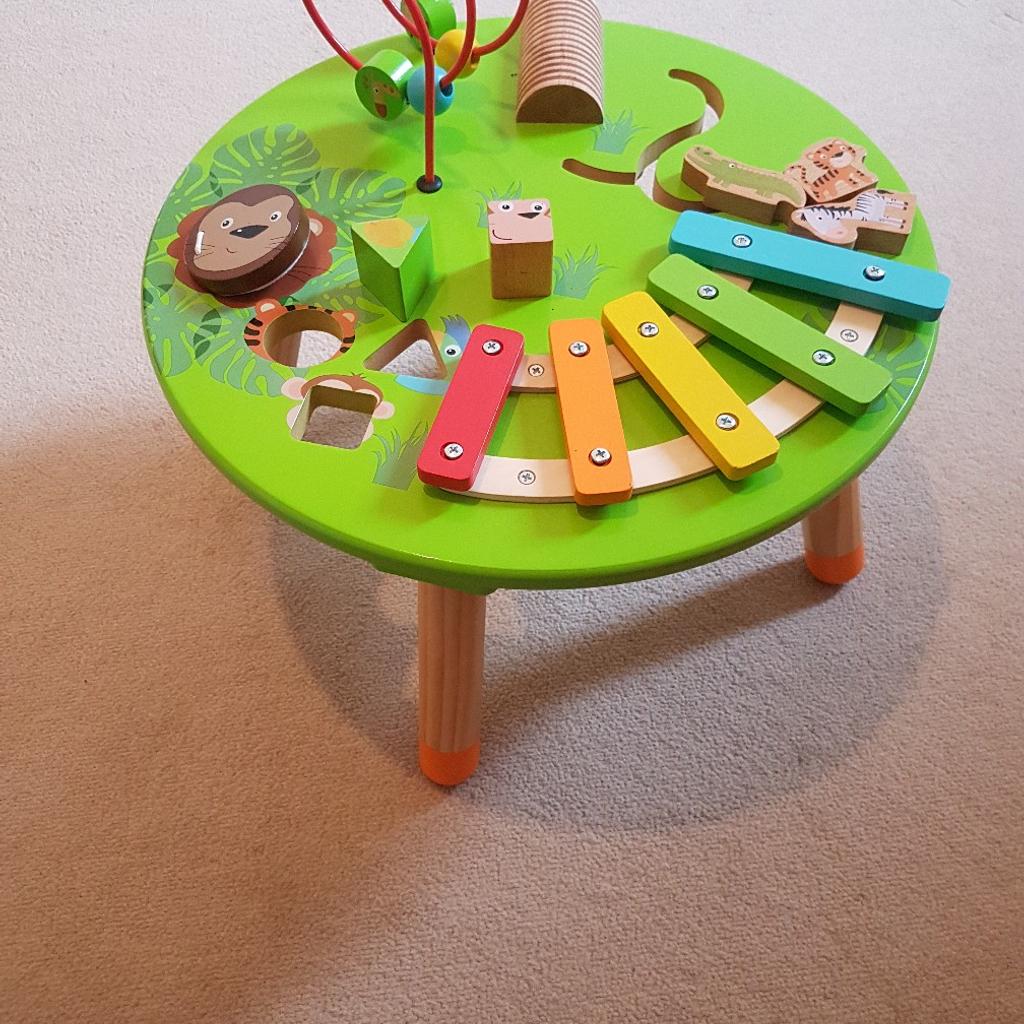 Carousel wooden activity store table