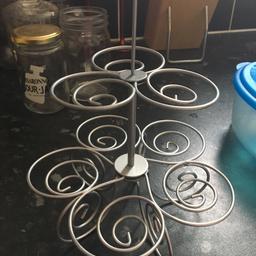 Metal, wire effect cake stand. Small. Comes with box, easy to store away. Holds 9 cupcakes. Buyer to collect.