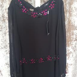New black top
Size 18