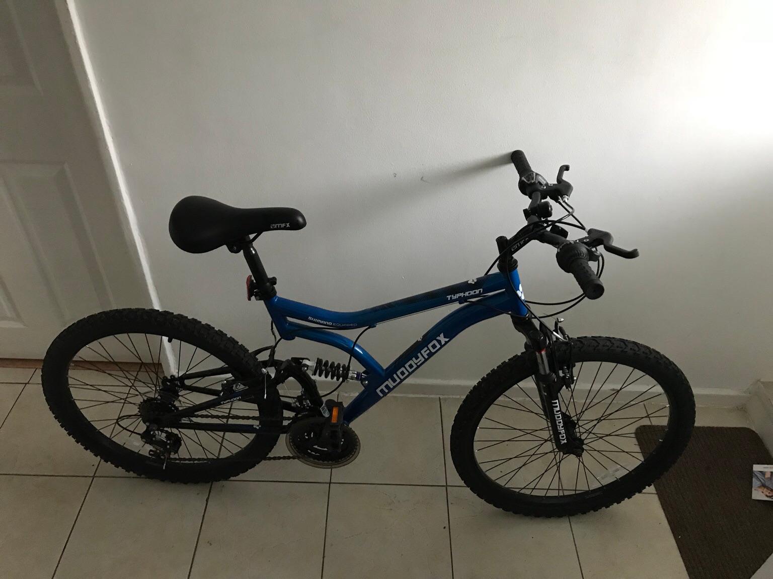 muddyfox typhoon 24 inch dual suspension bike