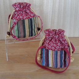 Pair of striped cotton mini boho hippy purses with drawstring top
Both new without tags RRP £4 each. (Price is for the pair) Great for the summer festivals
Collection Braintree