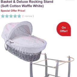 Clair de lune Moses basket with stand which can be adjusted to rock . Like new only used a couple of times as purchased a next to me