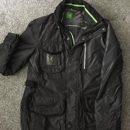 Genuine Hugo Boss Coat
Selling as no longer fit 
XL tag but would fit a large 
Free postage
Bought for £450