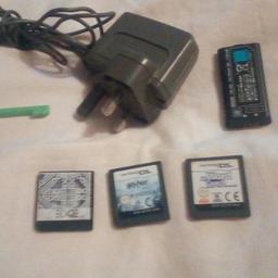 Nintendo ds charger...pen and games.and spare battery. There are one memory card with around 70 Games on.. There is a Harry Potter. And my word coach. On the other 2.all for 20 quid