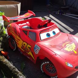 My sons lightning mcqueen ride on, usual scuffs and age related marks fully working with charger