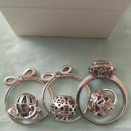 Two bow rings with stones miss g from each see pictures size 60 (large)

Silver platinum plated cz ring size large (62)

Beautiful Disney carriage charm

Locket charm

Patterned ball charm with a couple of small stones missing but unnoticeable

Selling as a bundle