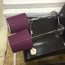 2 purple bed side lamps with on/off button on lead with chrome base.
07376374112