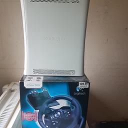 Xbox 360..Hardly used excellent condition with 20 games and steering wheel.