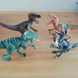 Jurassic world raptors in lovely used con :)
Blue makes noises and they all have moveable limbs