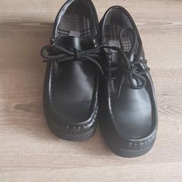 Black size 3 shoes in excellent condition.