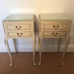Beautiful antique pair of bedside tables bought from Harrods in the 1950's. They are ivory in colour with gold detail around the edges. The photots really dont do justice to them. They both have a protective glass top.

They are second hand and have some slight marks. They would make a perfect upcycle project as structurally are in good condition.

For collection near Vauxhall tube station.

Also selling matching dressing table and chest of draws.