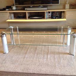 Glass coffee table with sliver legs