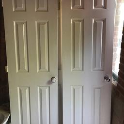 13 White internal 6 panel doors, good condition with latches and door knobs