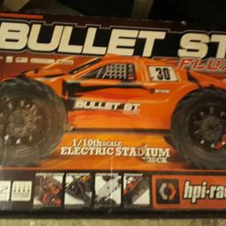 Bullet flux with upgraded motor and esc. Has also got full alloy conversion on hubs and wish bones . Comes with 2 Lipo batteries and charger. Plenty of spares included. Esc is programmable and water proof. Truck is in top condition. Radio gear is 2.4 and handset included. I also have all the boxes. Very little used so grab a bargain