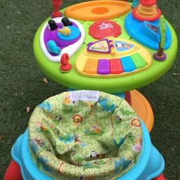 Good condition baby walker with table