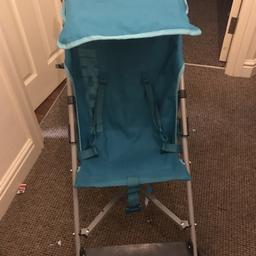 Blue stroller ... has rain over too the canopy can also be used as a bag as shown in the pics !