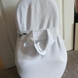 Redcastle Cocoonababy. Comes with adjustable leg support, strap, fitted sheet, and cover.