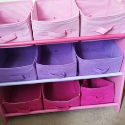 Toy tidy boxes and book tidy. Both have some small marks and need a bit of a clean. The darker pink boxes have had a lot of use but have a lot of life left in them. The other boxes are fine