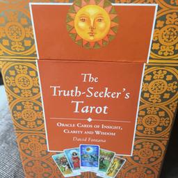 Unopened - brand new. Tarot cards comes with guide book.