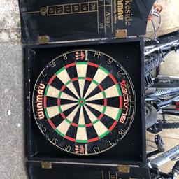 Used but excellent condition winmau lakeside blade 4 dartboard in cabinet with score chalkboards.
No darts included