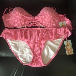 New with tags Next pink polka dot bikini. Top is size 38 D/DD is underwired and feels totally ‘safe’ with or without the removable straps. Bottoms size 18 with very flattering cute frill. Never worn as ordered 2 sizes and forgot to return the one that was too big! Cost £40 originally so grab a bargain!