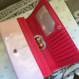 Brand New Pink Ted Baker Purse never used as you can see.