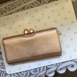 Brand New Ted Baker Purse in Gold, no marks on it as you can see in the photographs