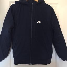 Nike boys lightly padded jacket with a hood. Age 13-15 years. XL boys 158-170. Used but good condition.