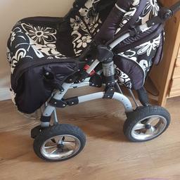 Black pram very good condition first one here can have it or it's going the tip will not keep till never ever so first one here can have it