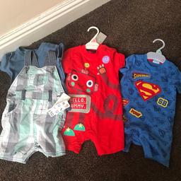 Never been worn baby boy clothes age ranging 6-9 months