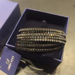 Slake Armband von Swarovski in schwarz-weiß zu verkaufen. 
Neu und ungetragen mit original Verpackung.