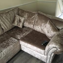 Crushed velvet corner sofa with foot stool, only had this sofa for 3 months selling as moving abroad, paid 1400 for it, scatter back and can be used for left or right hand.