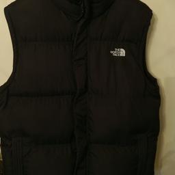 Black North face guillet, size large and in good condition