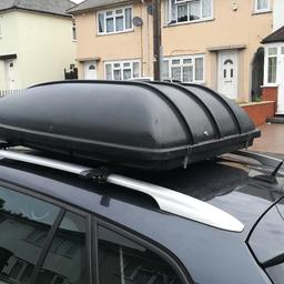 Roofbox for sale with all brackets and 1 key.  Rails not included.