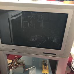 Old Philips tv with a two shelf stand 
working fine just cd drive faulty 
Work good 
Can be used as spears and repairs 
Just wants to get rid off
Collection only