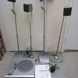 Has 4 adjustable height speaker stands and instruction book ..