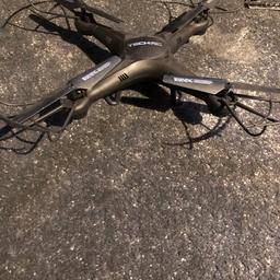 Black drone with camera and remote control 
Can be delivered for a small fee depending on location