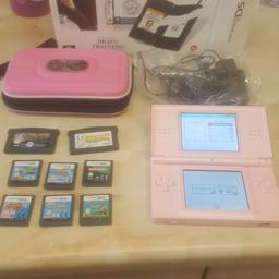 Nintendo  pink ds all works 
Comes with 8 games ( no cases )
A pink case 
Box and charger
