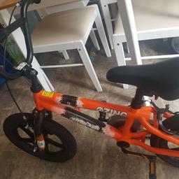 Unisex bike mint condition only been used 3 times selling because my son needs a bigger bike bargain