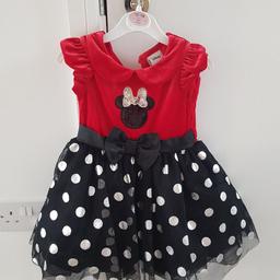 Disney's mini-mouse tutu dress. Red black and white polka dot so adorable on. In perfect condition and only worn once for two hours. £10