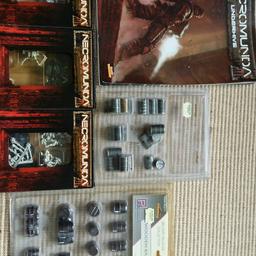 This is a mixture of sets that has:
-Necromunda underhive (rule book etc)
-necromunda Ratskin gang (unopened)
-necromunda Escher gang (unopened)
-necromunda Goliath gang (unopened)
-2 tabletop scenery sets (barrells)
