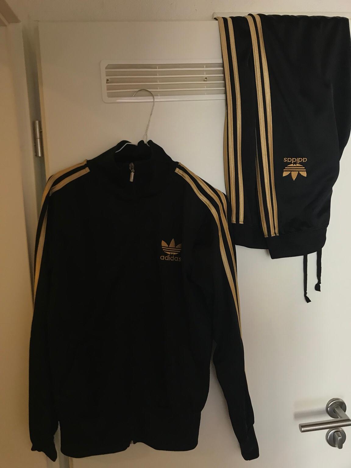 Adidas anzug damen store schwarz gold