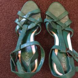 Green sandal in excellent condition size 39