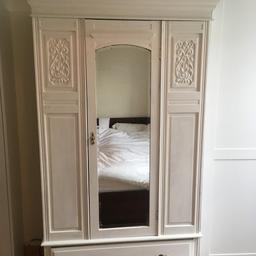 Beautiful antique walnut wardrobe with drawer, hanging rail and hooks. 

Splits into three sections (detachable pelmet and base) for easy transportation. 

Freshly painted in antique white. Age related wear and tear as to be expected, but it's solid and overall condition is good. 

H - 210cm
W - 115cm
D - 50cm